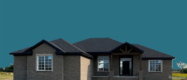 4940 Daisy Ln, Almont, MI 48003 - view of front of house featuring brick siding