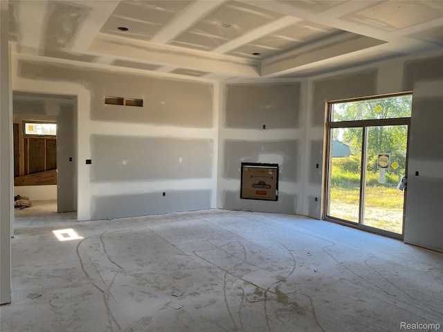 4940 Daisy Ln, Almont, MI 48003 - unfurnished living room featuring plenty of natural light