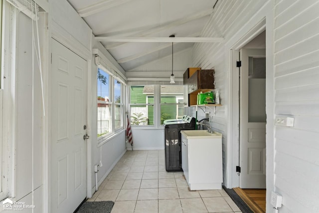 320 E Main St, Flushing, MI 48433 - laundry room with washer / dryer and light tile patterned floors