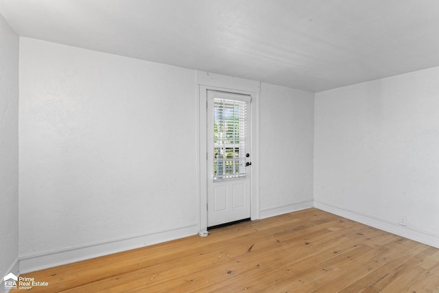 320 E Main St, Flushing, MI 48433 - unfurnished room featuring light wood-type flooring and baseboards