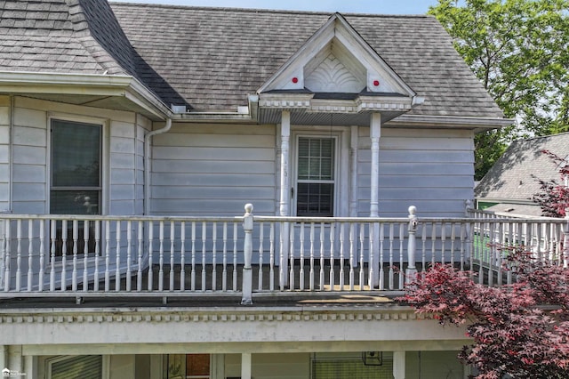 320 E Main St, Flushing, MI 48433 - entrance to property featuring a balcony and roof with shingles