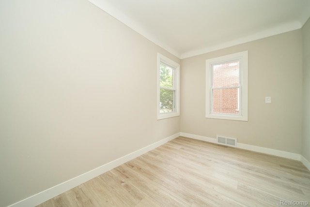1922 N Wilson Ave, Royal Oak, MI 48073 - unfurnished room featuring baseboards and light wood-type flooring