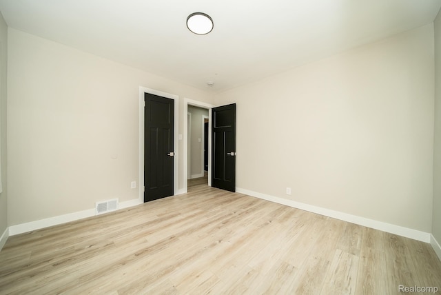 1922 N Wilson Ave, Royal Oak, MI 48073 - spare room with wood finished floors and baseboards