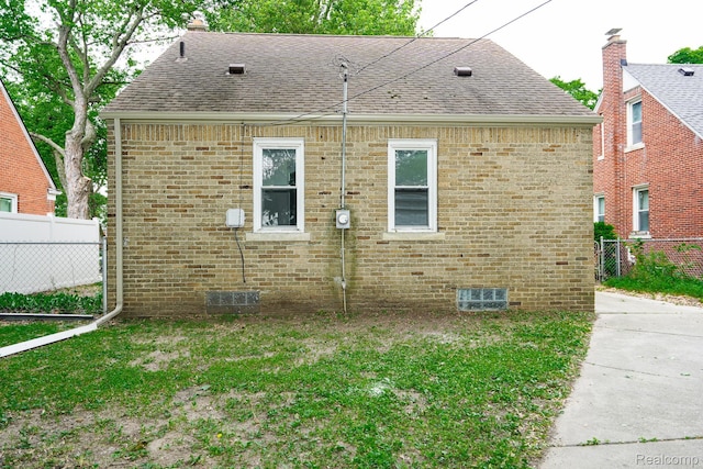 1922 N Wilson Ave, Royal Oak, MI 48073 - view of property exterior with roof with shingles, crawl space, and brick siding