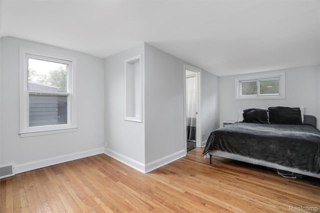 1605 N Vermont Ave, Rochester, MI 48067 - bedroom with light wood-style flooring and baseboards