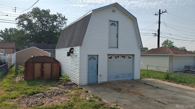 5157 Niagara St, Wayne, MI 48184 - garage featuring a garage and driveway