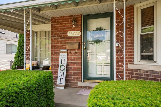 11372 Riverdale Ave, Redford, MI 48239 - entrance to property with brick siding and covered porch