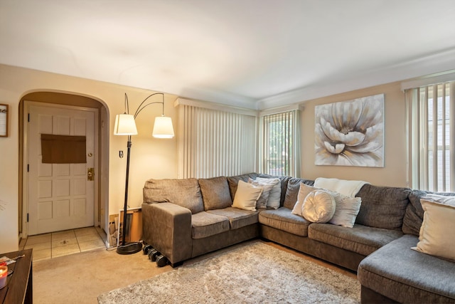11372 Riverdale Ave, Redford, MI 48239 - living room featuring arched walkways and light colored carpet