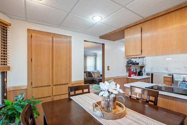 11372 Riverdale Ave, Redford, MI 48239 - dining space with a wainscoted wall and a drop ceiling