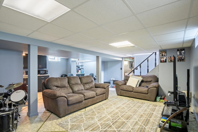 11372 Riverdale Ave, Redford, MI 48239 - living room featuring a paneled ceiling and stairway