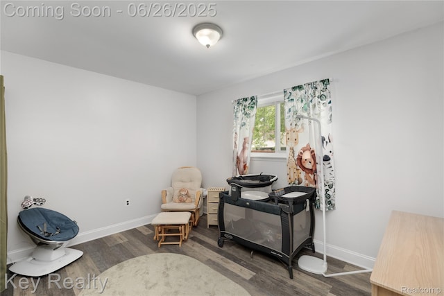 9468 Washington St, Romulus, MI 48174 - living area with wood finished floors and baseboards