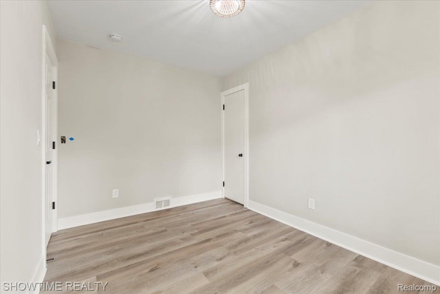 24611 Kenosha St, Oak Park, MI 48237 - unfurnished room featuring wood finished floors and a smoke detector