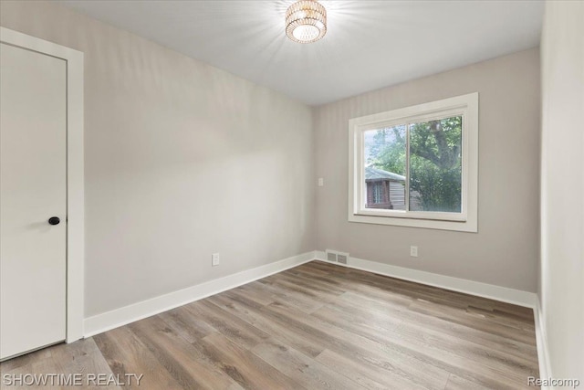 24611 Kenosha St, Oak Park, MI 48237 - empty room featuring wood finished floors
