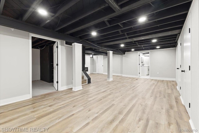 24611 Kenosha St, Oak Park, MI 48237 - finished basement with light wood finished floors and baseboards
