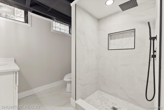 24611 Kenosha St, Oak Park, MI 48237 - full bath featuring a tile shower, vanity, and marble look tile flooring