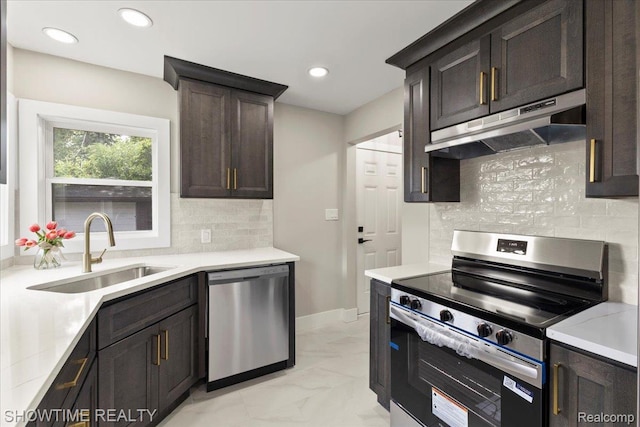 24611 Kenosha St, Oak Park, MI 48237 - kitchen featuring appliances with stainless steel finishes, under cabinet range hood, light marble finish floors, backsplash, and dark brown cabinetry
