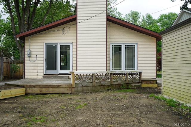 3911 Thomas Ave, Berkley, MI 48072 - back of property with a chimney and a deck