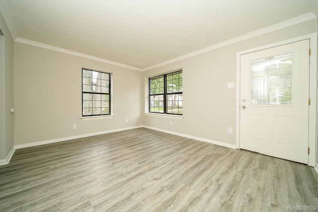 3911 Thomas Ave, Berkley, MI 48072 - foyer entrance with crown molding and light wood-style flooring