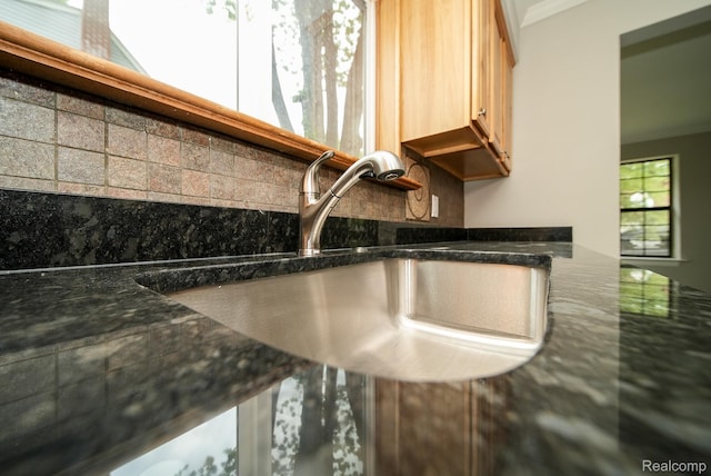 3911 Thomas Ave, Berkley, MI 48072 - kitchen view of decorative backsplash and light brown cabinetry