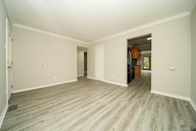 3911 Thomas Ave, Berkley, MI 48072 - empty room featuring light wood finished floors and ornamental molding