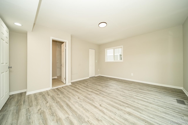 3911 Thomas Ave, Berkley, MI 48072 - unfurnished bedroom with light wood-style floors, connected bathroom, and recessed lighting