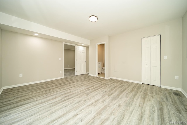 3911 Thomas Ave, Berkley, MI 48072 - unfurnished bedroom featuring light wood-style flooring, a closet, and recessed lighting