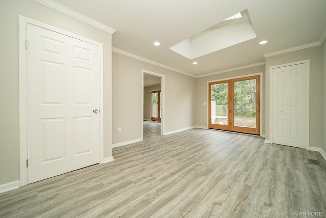 3911 Thomas Ave, Berkley, MI 48072 - unfurnished room featuring a skylight, healthy amount of natural light, light wood finished floors, recessed lighting, and crown molding