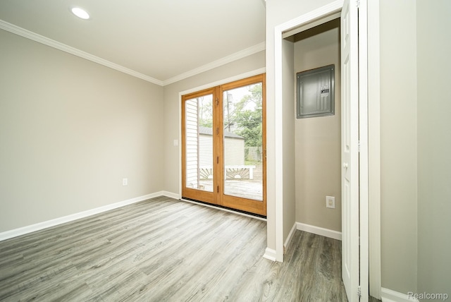 3911 Thomas Ave, Berkley, MI 48072 - entryway featuring ornamental molding, light wood-type flooring, french doors, recessed lighting, and electric panel