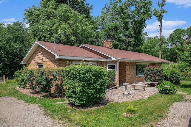 10158 US Highway 31, Berrien Springs, MI 49103 - ranch-style house with brick siding and a chimney