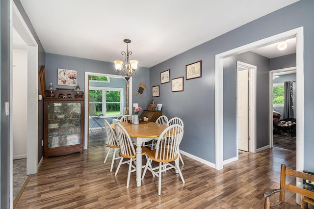 10158 US Highway 31, Berrien Springs, MI 49103 - dining room featuring wood finished floors and a chandelier
