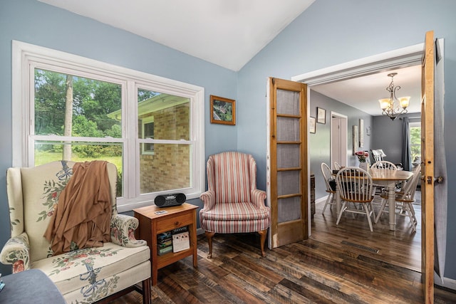10158 US Highway 31, Berrien Springs, MI 49103 - living area with a chandelier, vaulted ceiling, and dark wood-type flooring