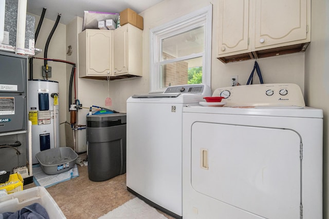 10158 US Highway 31, Berrien Springs, MI 49103 - washroom with electric water heater, washing machine and dryer, and cabinet space
