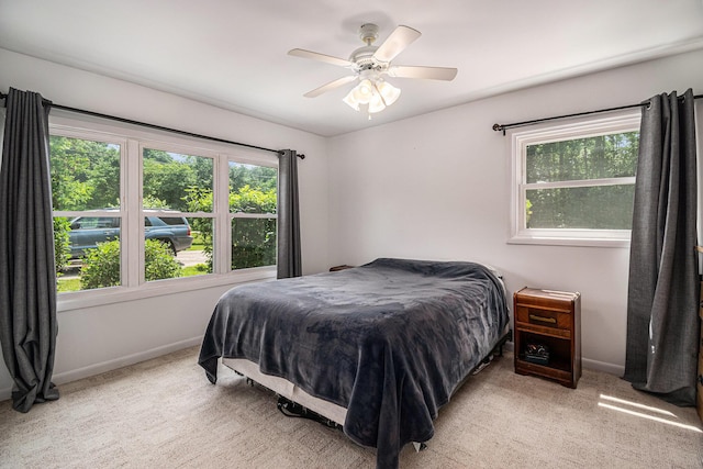 10158 US Highway 31, Berrien Springs, MI 49103 - carpeted bedroom with baseboards and a ceiling fan