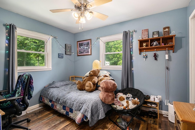 10158 US Highway 31, Berrien Springs, MI 49103 - bedroom featuring multiple windows, dark wood-style floors, and ceiling fan