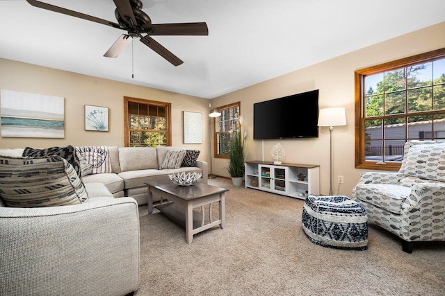 1724 N Ridge Rd, Mears, MI 49436 - carpeted living room with plenty of natural light and a ceiling fan