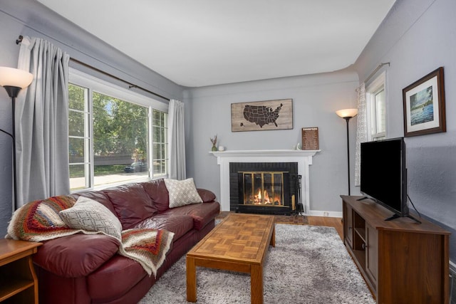 2511 Belfast Ave SE, Grand Rapids, MI 49507 - living area featuring a fireplace and wood finished floors