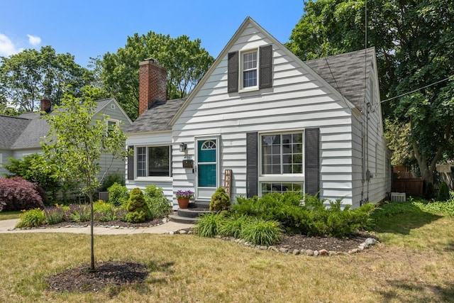 2511 Belfast Ave SE, Grand Rapids, MI 49507 - view of front of home featuring a chimney