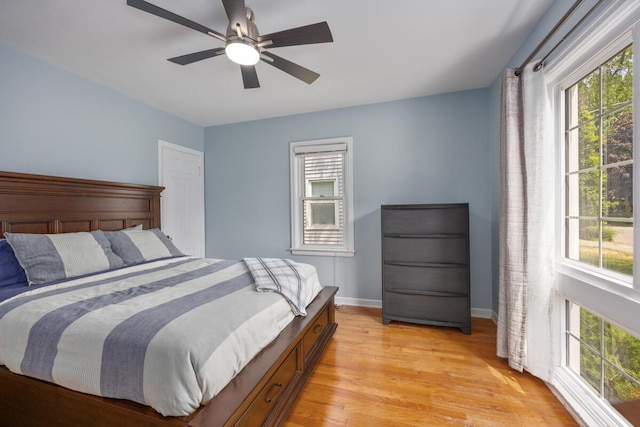 2511 Belfast Ave SE, Grand Rapids, MI 49507 - bedroom with light wood finished floors and a ceiling fan