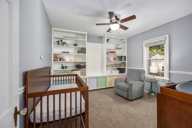 2511 Belfast Ave SE, Grand Rapids, MI 49507 - carpeted bedroom with a ceiling fan