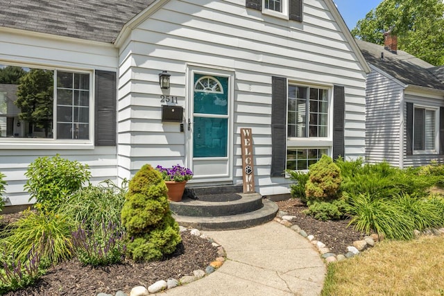 2511 Belfast Ave SE, Grand Rapids, MI 49507 - entrance to property with a shingled roof