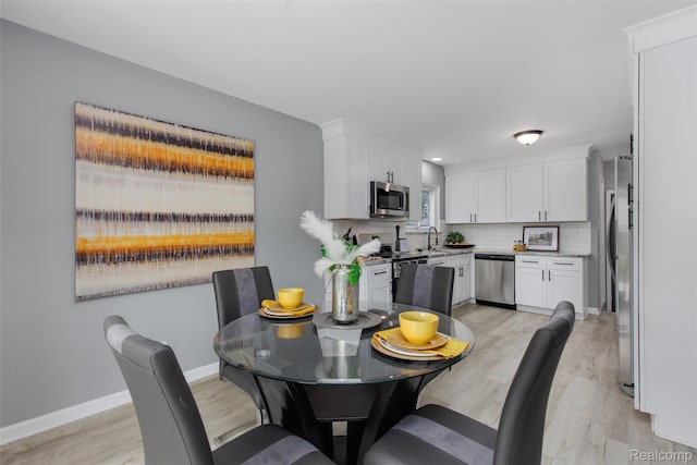 14671 Labelle St, Oak Park, MI 48237 - dining room featuring light wood-type flooring and baseboards