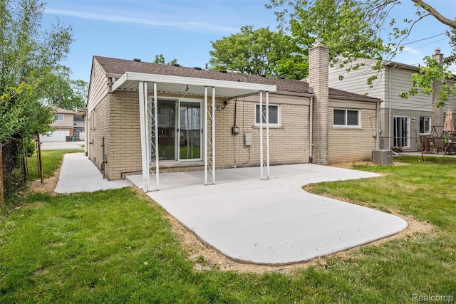 14671 Labelle St, Oak Park, MI 48237 - back of house with a patio, brick siding, a chimney, and a shingled roof
