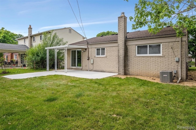 14671 Labelle St, Oak Park, MI 48237 - back of property with a patio, a chimney, and brick siding