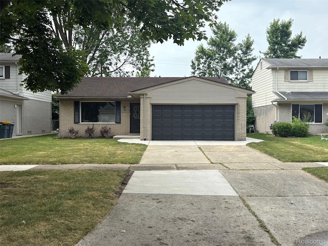 14671 Labelle St, Oak Park, MI 48237 - view of front of property featuring brick siding, a front yard, a garage, and driveway
