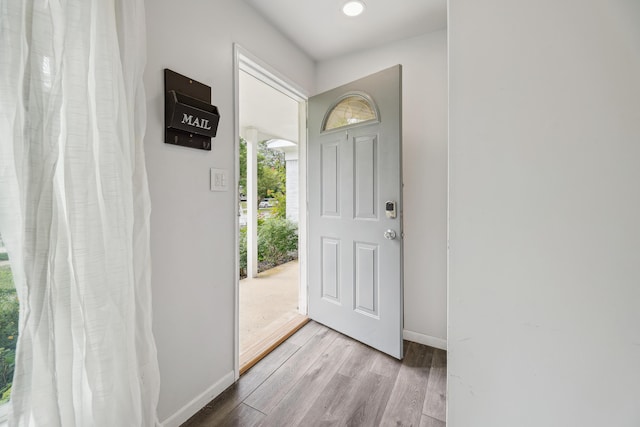 2362 Georgetown Blvd, Ann Arbor, MI 48105 - foyer with wood finished floors and recessed lighting