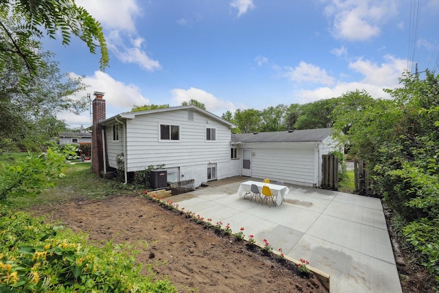 2362 Georgetown Blvd, Ann Arbor, MI 48105 - back of house with a patio and a chimney