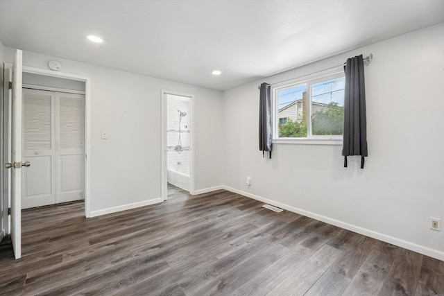 2362 Georgetown Blvd, Ann Arbor, MI 48105 - unfurnished bedroom featuring wood finished floors, recessed lighting, and ensuite bath