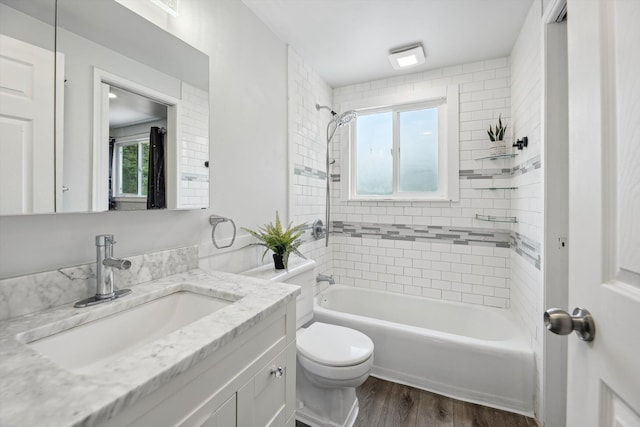 2362 Georgetown Blvd, Ann Arbor, MI 48105 - bathroom with vanity, wood finished floors, and shower / bathtub combination