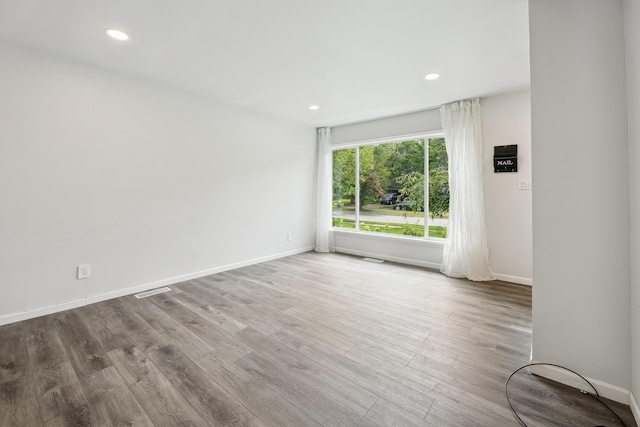 2362 Georgetown Blvd, Ann Arbor, MI 48105 - spare room with wood finished floors and recessed lighting