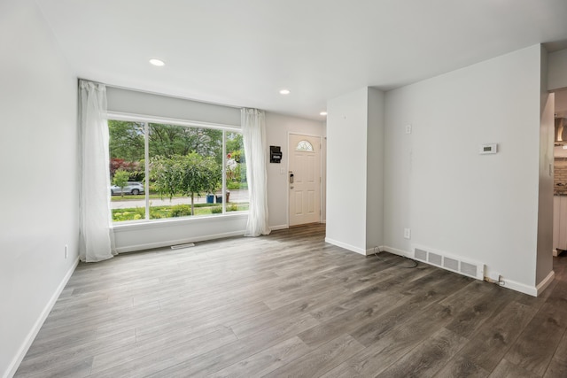 2362 Georgetown Blvd, Ann Arbor, MI 48105 - unfurnished living room with wood finished floors and recessed lighting